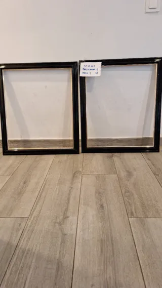 Marco de fotos negro y dorado