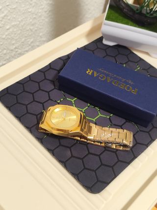 Reloj poedagar Hombre Dorado