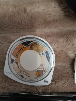 Sony PSP Negra + 2 UMDs