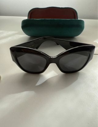 Gafas de sol Gucci mujer negras y doradas