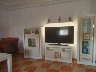 Muebles de salón blancos y dorados