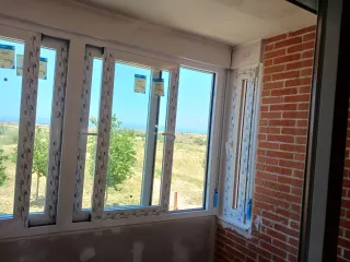 Ventanas aluminio y PVC y cerramientos de terrazas