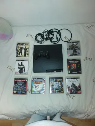 PS3 Slim 160GB Negra + Mando y Juegos