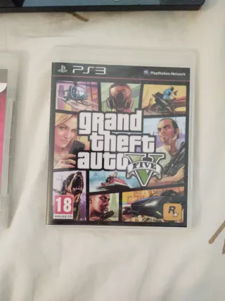 PS3 Slim 160GB Negra + Mando y Juegos