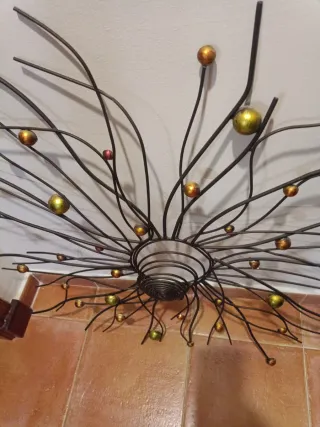 Decoración de forja estilo sol