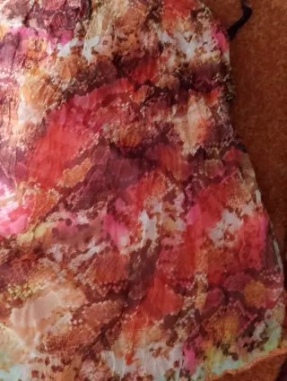 Top fantasia allacciato al collo