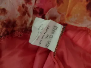 Top fantasia allacciato al collo