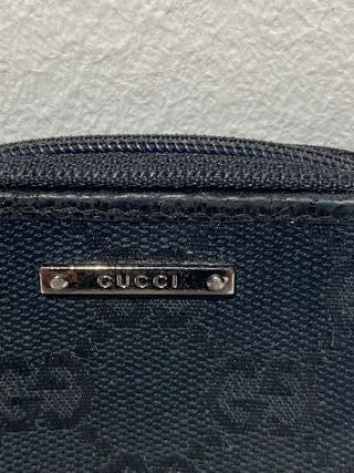 Portafoglio mini in pelle e tessuto di Gucci