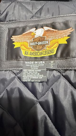 Chaqueta de cuero negra con flecos