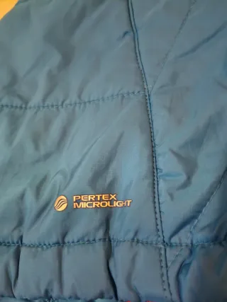 Chaleco Ternua Primalot Azul y Rojo.