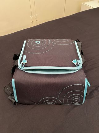 Trona-alzador portátil Munchkin