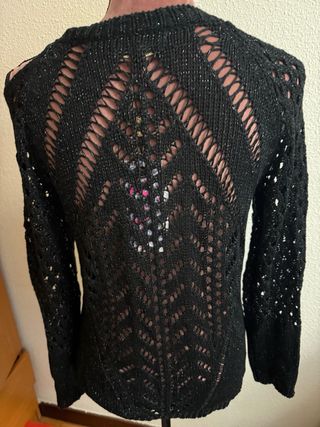 Blusa color negro con hilo plateado. Nueva