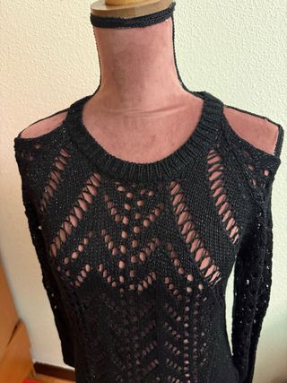 Blusa color negro con hilo plateado. Nueva