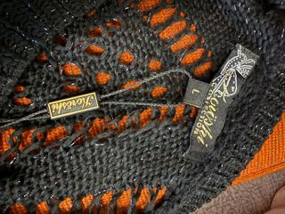 Blusa color negro con hilo plateado. Nueva