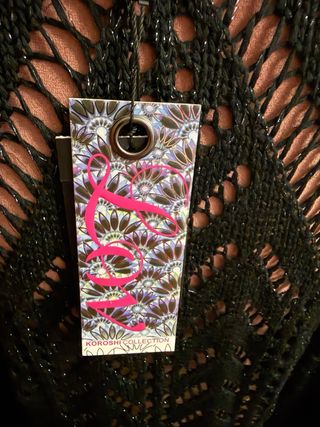 Blusa color negro con hilo plateado. Nueva