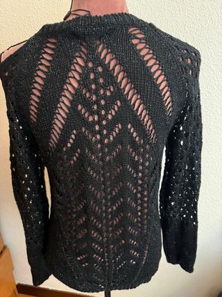 Blusa color negro con hilo plateado. Nueva