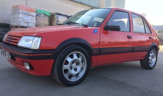 218-MOLDURAS Y ALETINES 205 GTI 5 PUERTAS