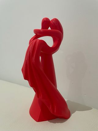 Figura pareja enamorados roja