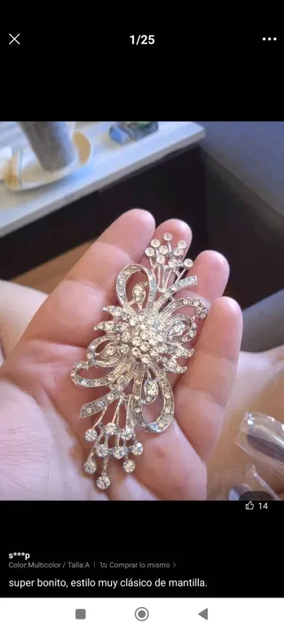 Broche plateado con pedrería