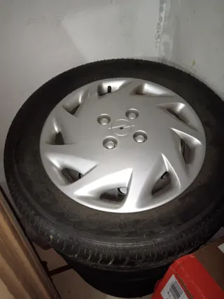 Llantas chapa 14" 4x100 con tapacubos Opel