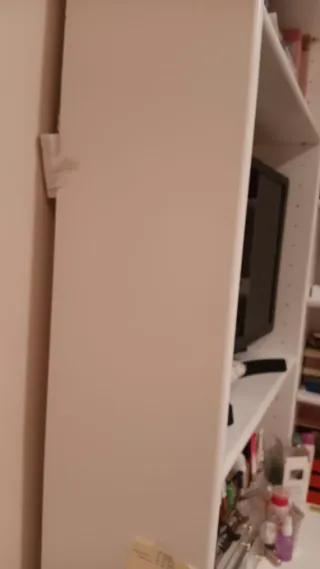 Mueble esquinero blanco y cristal