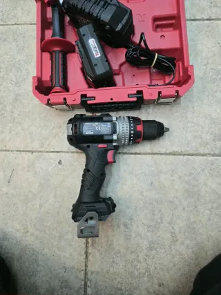 Taladro percutor Parkside con batería y cargador