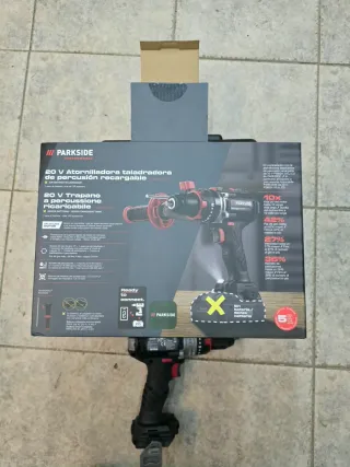 Taladro percutor Parkside con batería y cargador