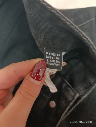 Pantalones vaqueros anchos negros rasgados