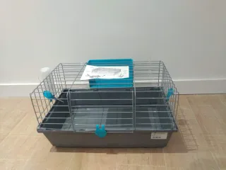 Jaula para mascotas gris y turquesa