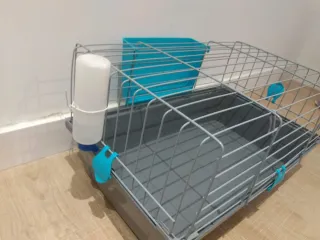 Jaula para mascotas gris y turquesa