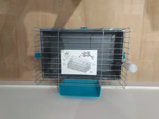 Jaula para mascotas gris y turquesa