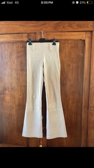 Pantaloni a zampa avorio taglia L