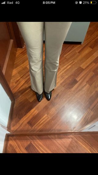 Pantaloni a zampa avorio taglia L