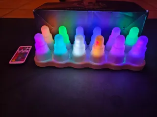 12 candele led ricaricabili wireless multicolore.