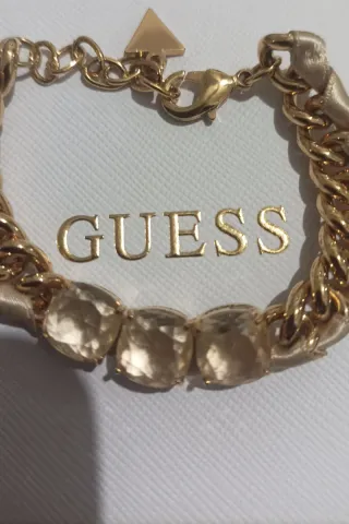 Pulsera Guess eslabones dorados con piedras beige