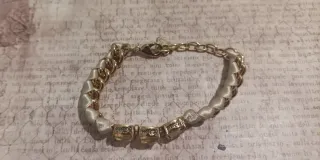 Pulsera Guess eslabones dorados con piedras beige