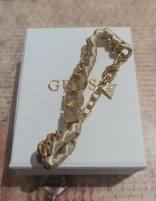 Pulsera Guess eslabones dorados con piedras beige