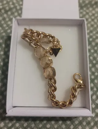 Pulsera Guess eslabones dorados con piedras beige