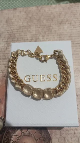 Pulsera Guess eslabones dorados con piedras beige