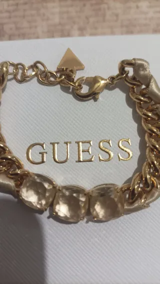 Pulsera Guess eslabones dorados con piedras beige