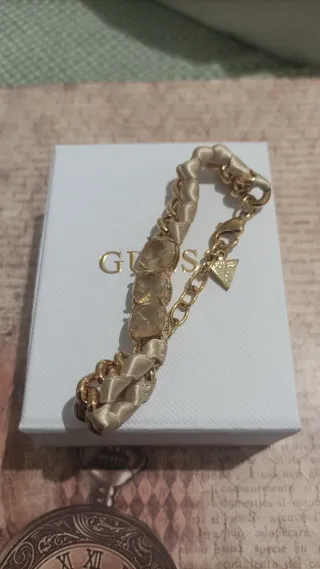 Pulsera Guess eslabones dorados con piedras beige