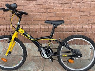 Bicicleta infantil BTWIN negra y amarilla