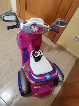 Triciclo eléctrico infantil rosa