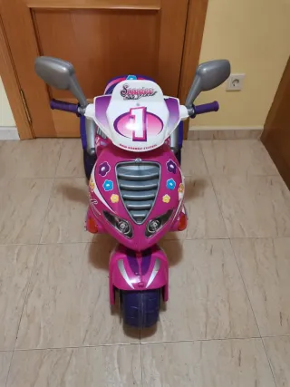 Triciclo eléctrico infantil rosa