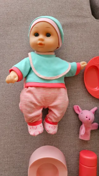 Muñeco bebé con carrito y accesorios