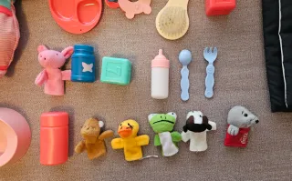 Muñeco bebé con carrito y accesorios