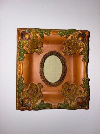 Marco decorativo ovalado