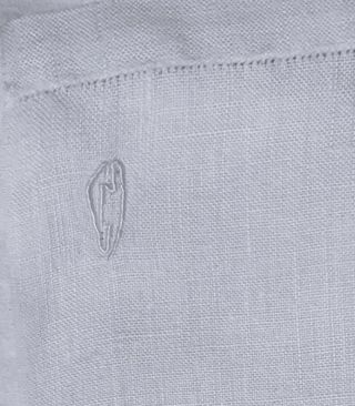 Asciugamano in lino con ricamo a mano