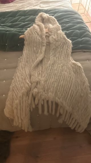 Chalecos variados de piel de zorro y conejo