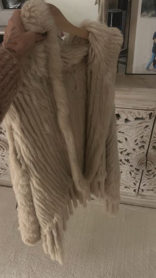 Chalecos variados de piel de zorro y conejo